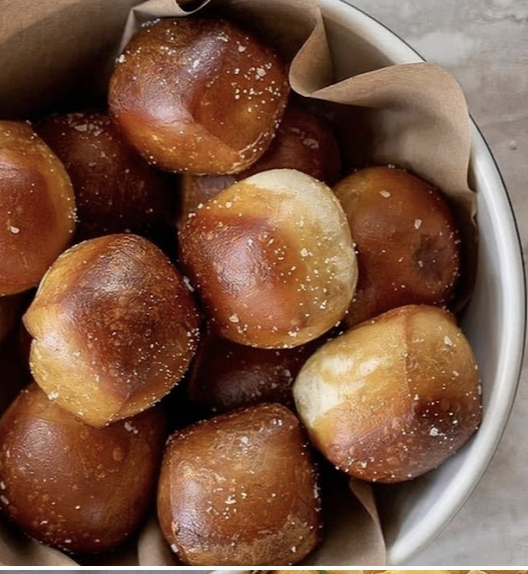Culinary Dropout signature dishes Soft Pretzels & Provolone Fondue36-Hour Pork RibsRoasted Salmon